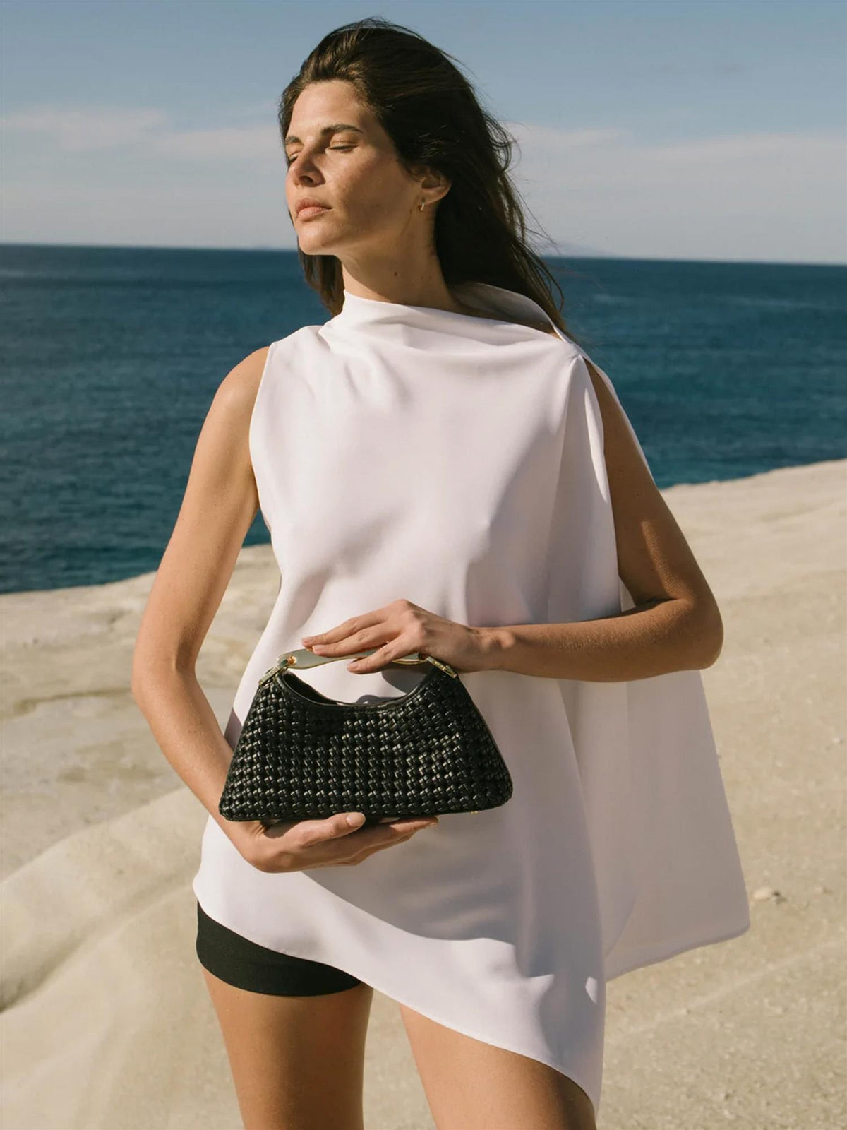 Mini Boomerang woven leather black